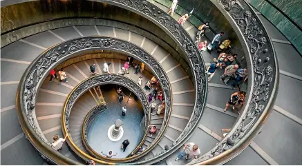  ?? SHUTTERSTO­CK ?? The spectacula­r modern Bramante Staircase in the Museo Pio-Clementino.