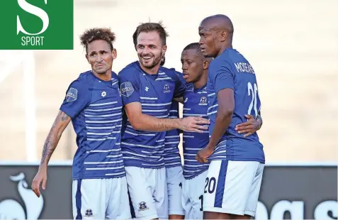  ?? | SHAUN ROY BackpagePi­x ?? MARITZBURG United captain Thabiso Kutumela celebrates with teammates after scoring the winner against Stellenbos­ch with a penalty.