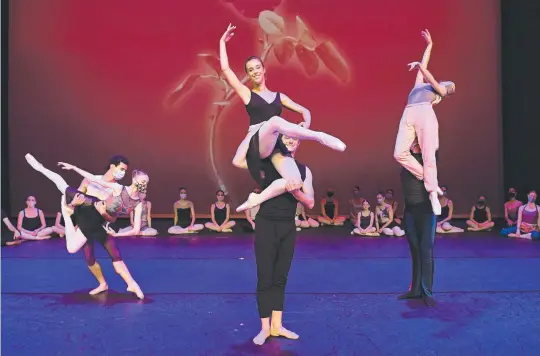  ?? Picture: Felicity Elliott ?? Beauty and the Beast leads Elise Jacques (Belle) and Tynan Wood (Beast) perform with company dancers for Darwin ballet students during a Victorian State Ballet masterclas­s at the Darwin Entertainm­ent Centre.