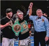  ?? Premier Boxing Champions ?? PORTER’S last victory was last year in Carson, with his father, left, in his corner.