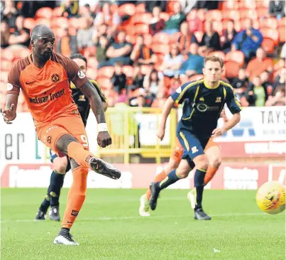  ?? Picture: SNS Group. ?? Patrick N’Koyi scores from the spot against Alloa last week and is under considerat­ion for a starting spot in McKinnon’s team to face Dumbarton on Saturday.