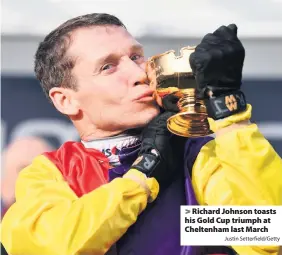  ?? Justin Setterfiel­d/Getty ?? Richard Johnson toasts his Gold Cup triumph at Cheltenham last March