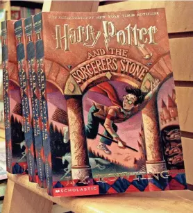  ?? ?? Copies of author J. K. Rowling’s Harry Potter books sit in a bookstore in Arlington, Va., in 2000. The fourth book in the series, “Harry Potter and the Goblet of Fire,” was due for release just after midnight July 8 that year.