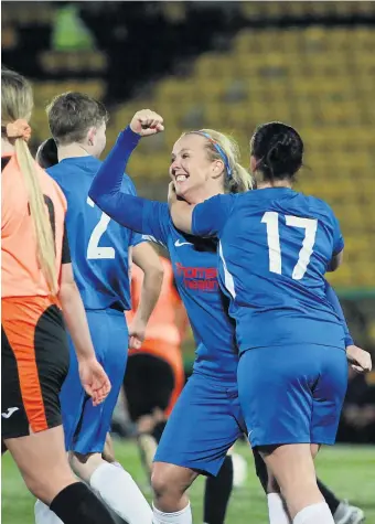  ?? ?? Captain fantastic Colleen Donnelly celebrates netting Bishopton’s third of the evening