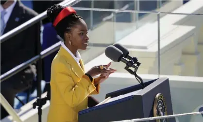  ?? Photograph: Carolyn Kaster/AP ?? A ray of pure sunshine: poet Amanda Gorman wears a buttercup yellow coat at Joe Biden’s inaugurati­on.