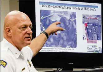  ?? TY GREENLEES / STAFF ?? Dayton Police Lt. Paul Saunders narrates the timeline the department re-created with business and resident security camera footage on the night of the mass shooting in the Oregon District.