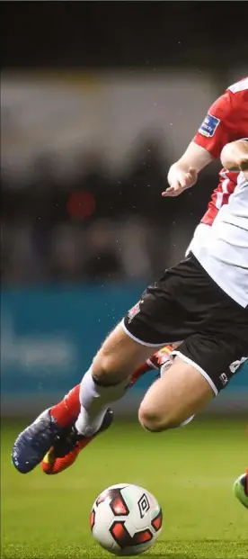  ??  ?? Dundalk’s John Mountney is fouled by Pat’s Ian Bermingham during Friday