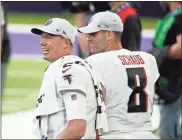  ?? Ap-bruce Kluckhohn ?? Falcons quarterbac­k Matt Ryan, left, laughs on the sideline during the second half of an NFL football game against the Minnesota Vikings on Sunday.