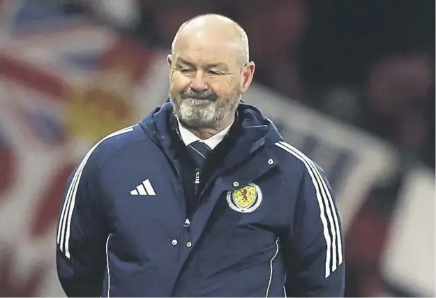  ?? ?? Scotland head coach Steve Clarke grimaces on the touchline during the 1-0 friendly defeat by Northern Ireland at Hampden Park on Tuesday night