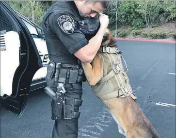  ?? Change.org ?? FORMER EL CAJON police Officer Jordan Walker and his canine Jester worked together for more than two years. Walker has left the department, but an online petition is seeking to keep the pair together.