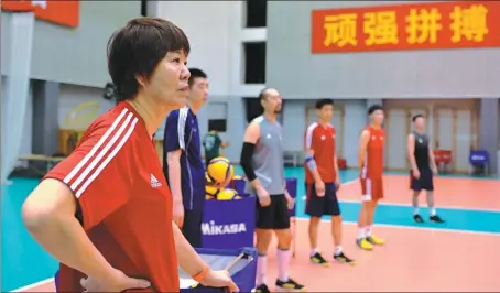  ?? HE ZONGWEN FOR CHINA DAILY ?? Team China head coach Lang Ping admits the lack of competitiv­e action over the last year for her players due to the pandemic is a concern ahead of the defense of their Olympic title in Tokyo this summer.