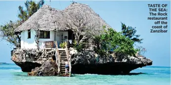  ??  ?? TASTE OF THE SEA: The Rock restaurant off the coast of Zanzibar