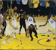  ?? GETTY IMAGES ?? Cleveland’s J.R. Smith rebounds a missed Warriors free throw and dribbles out the clock in regulation with the score tied in Game 1 of the 2018 NBA Finals. The Warriors won in overtime.