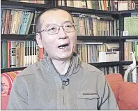  ?? AP PHOTO ?? In this file image taken from Jan 6, 2008, video, Liu Xiaobo speaks during an interview in his home in Beijing, China. Two foreign specialist­s who visited Liu said Sunday that the cancer-stricken Nobel Peace Prize laureate is still able to travel...