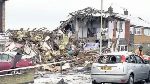  ??  ?? The scene of the explosion the day after it happened. (Josh Payne/PA Wire)