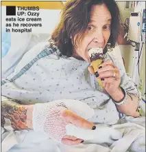  ??  ?? THUMBS UP: Ozzy eats ice cream as he recovers in hospital