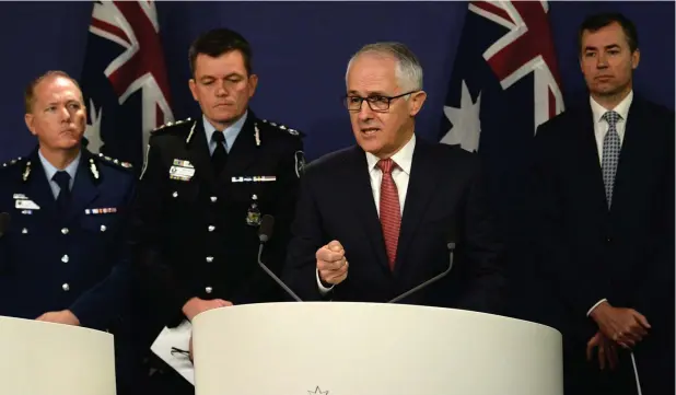  ?? Picture: JEREMY PIPER ?? THREAT ‘CREDIBLE’: Prime Minister Malcolm Turnbull holds a press conference in relation to recent terror raids across Sydney with Minister for Justice Michael Keenan, Commission­er of the Australian Federal Police Andrew Colvin and NSW Police...