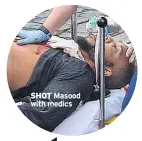  ??  ?? SHOT Masood with medics