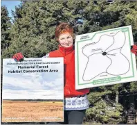  ?? DESIREE ANSTEY/THE JOURNAL PIONEER ?? MaryEllen Gaudet is continuing her cousin’s legacy to grow 12,000 white spruce trees, along with native hardwoods, into a forest surroundin­g a poppy shaped path in the Prince Edward Island community of Baltic.