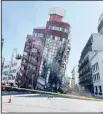  ?? ?? In this photo released by the Hualien City Government, a leaning building is cordoned off in the aftermath of an earthquake in Hualien, eastern Taiwan on April 3, 2024. (AP)