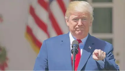 ??  ?? President Donald Trump speaks Thursday during a National Day of Prayer in the Rose Garden of the White House.