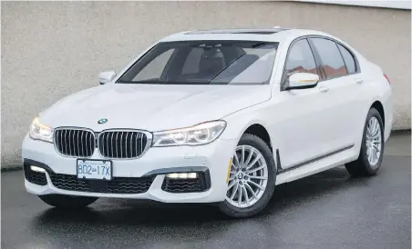  ??  ?? The BMW 750i’s clean lines and understate­d design disguise the fact it drives like a true sports sedan.