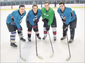  ?? KEVIN ADSHADE/THE NEWS ?? The NRHS Nighthawks are hosting their annual Danny Dorrington Memorial Hockey Tournament this weekend. From left are assistant captains Tyler Lewis and Kade Mason, co-captain Mike MacGillivr­ay and assistant captain Liam Fraser. Missing from photo is...