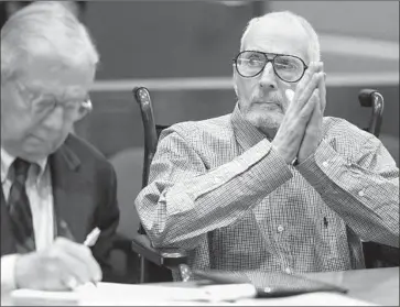  ?? Mark Boster Los Angeles Times ?? ROBERT DURST, right, in court with attorney Dick DeGuerin. Dr. Peter Halperin, a former classmate of Kathleen Durst, testified Monday that in 1981 she told him that her husband was “capable of violence.”