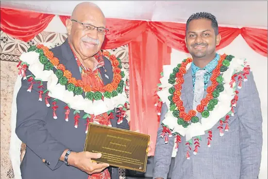  ?? PICTURE: SUPPLIED ?? Prime Minister Sitiveni Rabuka with Atish Prasad, owner of the Road King Farm Fresh Produce Facility in Taveuni.