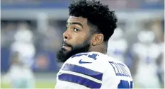  ?? RON JENKINS/THE ASSOCIATED PRESS ?? Dallas Cowboys’ Ezekiel Elliott stands on the sideline in the first half of a preseason NFL football game against the Indianapol­is Colts, in Arlington, Texas.