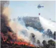  ?? FOTO: DPA ?? Ein Löschhubsc­hrauber ist in Spanien im Einsatz.