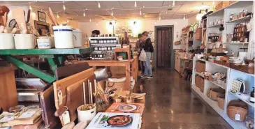  ?? ?? A look inside Des Moines Mercantile, the general store in Highland Park.