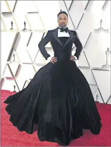  ?? [JORDAN STRAUSS PHOTOS/INVISION/AP] ?? Billy Porter arrives Sunday at the Oscars, dressed in a custom tuxedo and a tuxedo ball gown combined, by Christian Siriano.