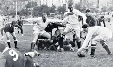  ??  ?? Faull (in the centre) for Swansea against Llanelli in 1962