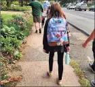  ?? Jennifer Pope / Contribute­d photo ?? Jennifer Pope’s daughter walks to her first day of fifth grade at Spring Glen Elementary School in Hamden.