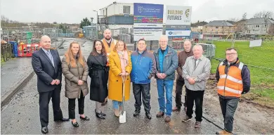  ?? ?? Housing developmen­t Cllrs Jacqui Todd and Douglas Reid with local members Cllrs Neil McGhee and Jim Roberts, Head of Housing Bob McCulloch and John Baggley from CCG