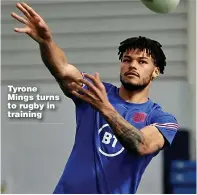  ??  ?? Tyrone Mings turns to rugby in training