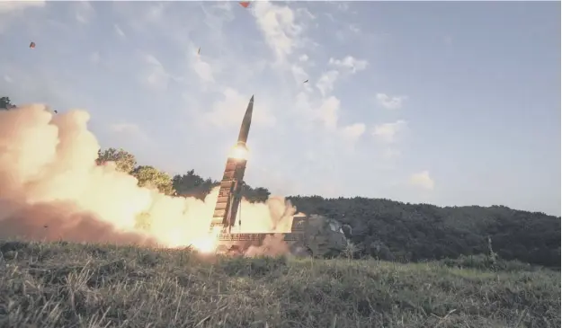  ?? PICTURE: SOUTH KOREA DEFENCE MINISTRY VIA AP ?? 0 A South Korean ballistic missile is fired during an exercise, as the country shows its resolve against the launches of the North