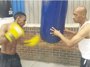  ??  ?? Mpho ‘Turbo’ Seforo and trainer Bernie Pailman hard at work for the boxer’s upcoming fight against Nkosinathi “Mabere” Joyi in December.