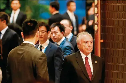  ?? BETO BARATA/PR ?? China. Acordado por assessores e surpreendi­do com as declaraçõe­s do procurador Janot, Temer pediu serenidade