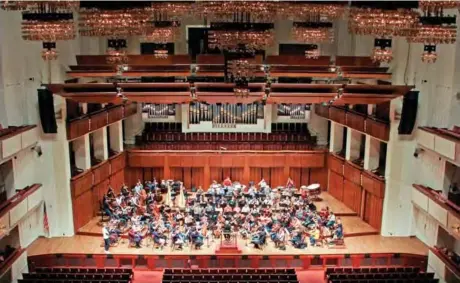  ??  ?? The West-Eastern Divan Orchestra performs during a rehearsal at the Kennedy Center.