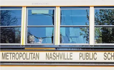  ?? Nicole Hester/associated Press ?? A child cries on a bus leaving the Covenant School in Nashville, Tenn., after a mass shooting there that killed three students, each 9 years old, and three adults.