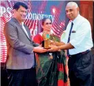  ?? ?? Plnr. L.H. Indrasiri, receiving the ITPSL Honorary Award (A lifetime Award) on behalf of Plnr. J. M. L. Jayasekara – Past President,