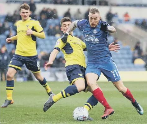  ??  ?? Marcus Maddison is battling to be fit for the Posh trip to Blackburn.