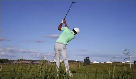  ?? RICK WOOD, TNS ?? Brooks Koepka drives off the 18th tee on his way to a 16-under par to win the U.S. Open on Sunday.