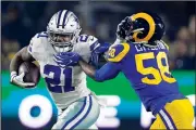  ?? AP File Photo ?? Dallas Cowboys running back Ezekiel Elliott pushes off Los Angeles Rams inside linebacker Cory Littleton on Jan. 12 during the first half of an NFL divisional playoff game in Los Angeles.