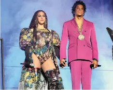  ?? PictureGro­up RAVEN VARONA ?? POWER couple Beyoncé and Jay-Z spoil each other with extravagan­t gifts.