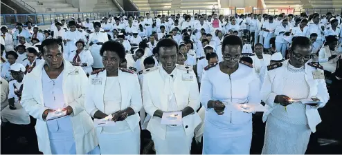  ?? Picture: Gallo Images/Sowetan/Sandile Ndlovu ?? Nurses hold candles during Internatio­nal Nurses Day celebratio­ns in Limpopo.