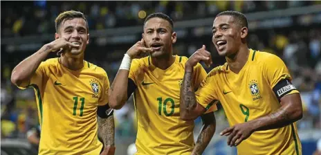  ??  ?? SAMBA STYLE: Brazil’s Philippe Coutinho (left), Neymar and Gabriel Jesus celebrate a goal against Argentina during the qualificat­ion stages for 2018 FIFA World Cup in Russia. No South American team has won a World Cup on European soil - can Brazil be...