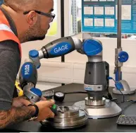 ??  ?? Adam Hoffman is pictured measuring a Blue Print brake disc and comparing its dimensions using a Fario Arm, a 3D measuremen­t tool, to verify the part’s dimensions against the OE specificat­ions.